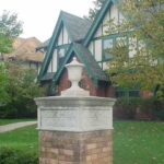 house with marker in front